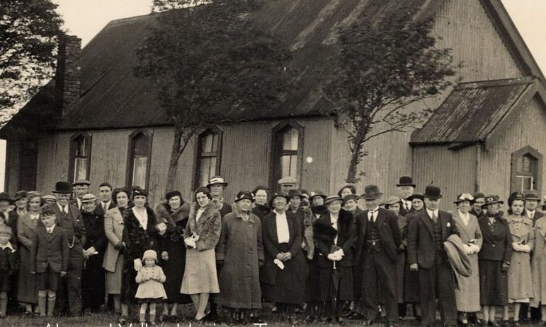 Parishioners standing outside of the church at south cobbinshaw