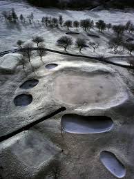 the site of bathgate castle on the golf course from an aerial view